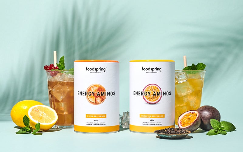 Two canisters of Energy Aminos, in iced tea and passionfruit flavors - how to be an early bird can include some energy aminos in your day!