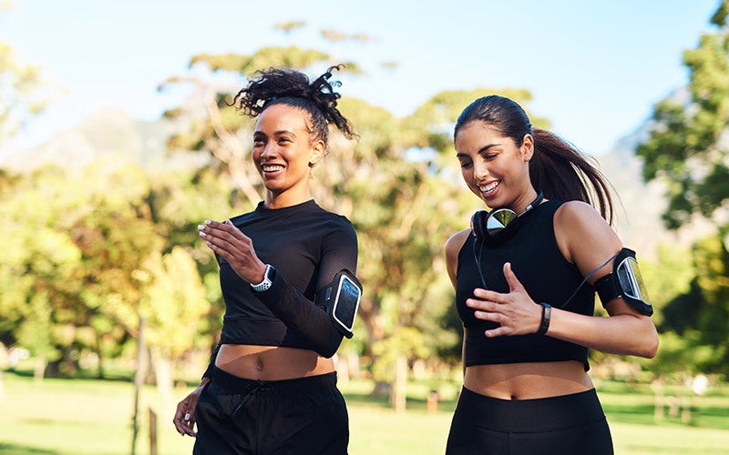 Two women go for a run, showing sports and nutrition can improve brain function