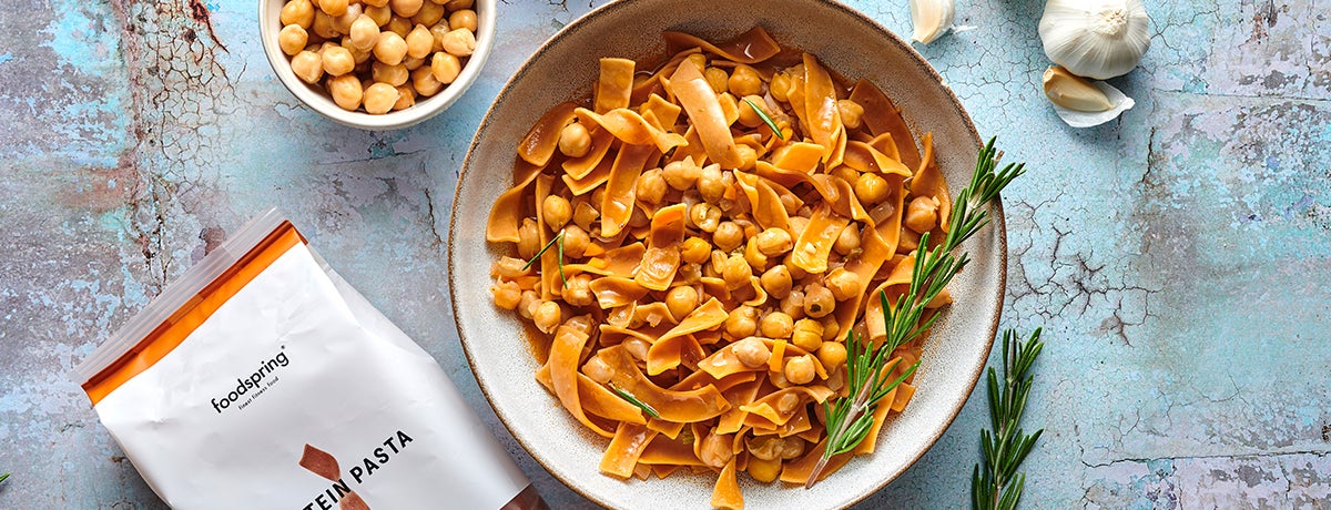 a bowl of protein pasta with chickpeas as seen from above