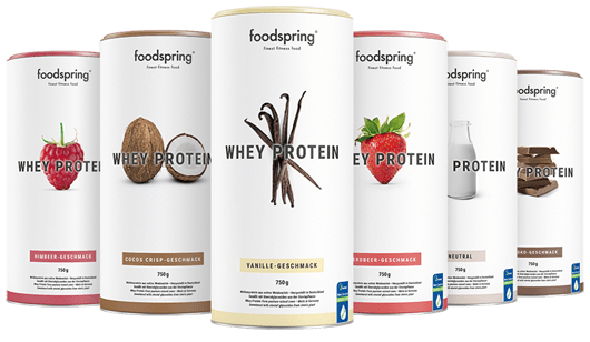 A selection of canisters of whey protein powder by foodspring