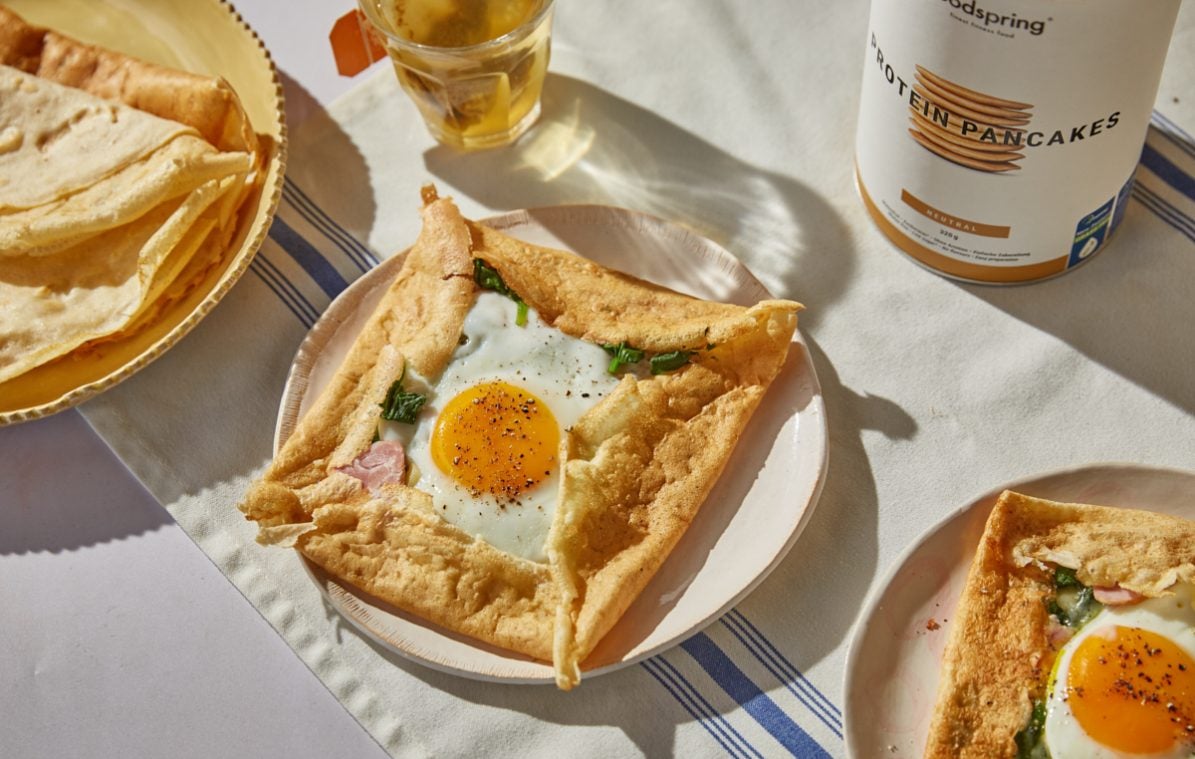 protein galettes crepe filled with egg, spinach and ham with a cup of tea
