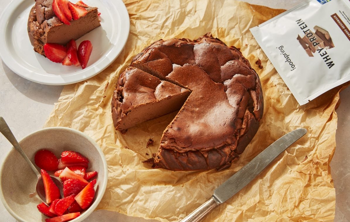 High protein baked chocolate cheesecake with strawberries
