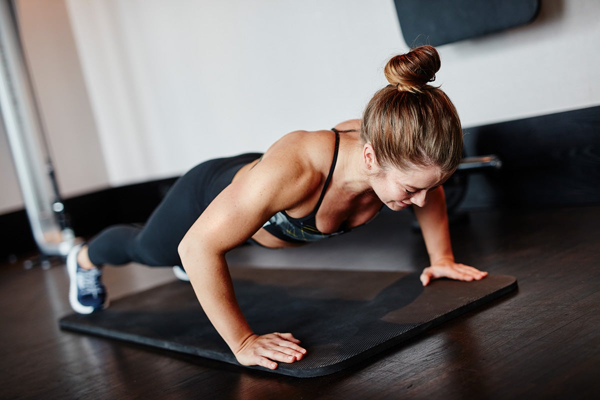 A woman doing push-ups 