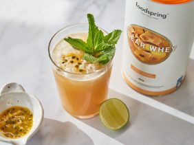 peach passionfruit cooler with sprig of mint