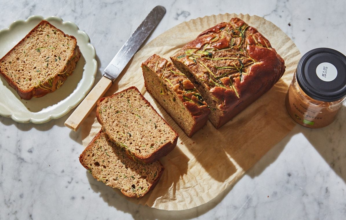 a sliced loaf of high protein zucchini bread