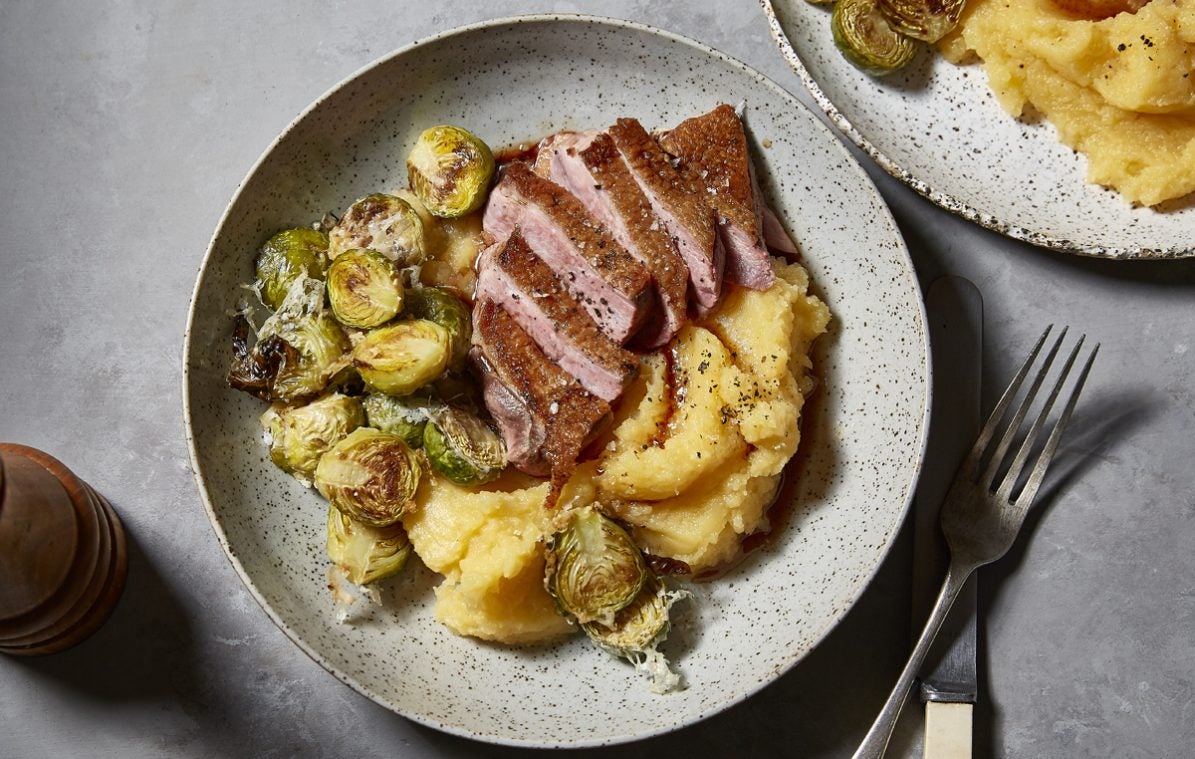 crispy duck breast with mash and brussels sprouts