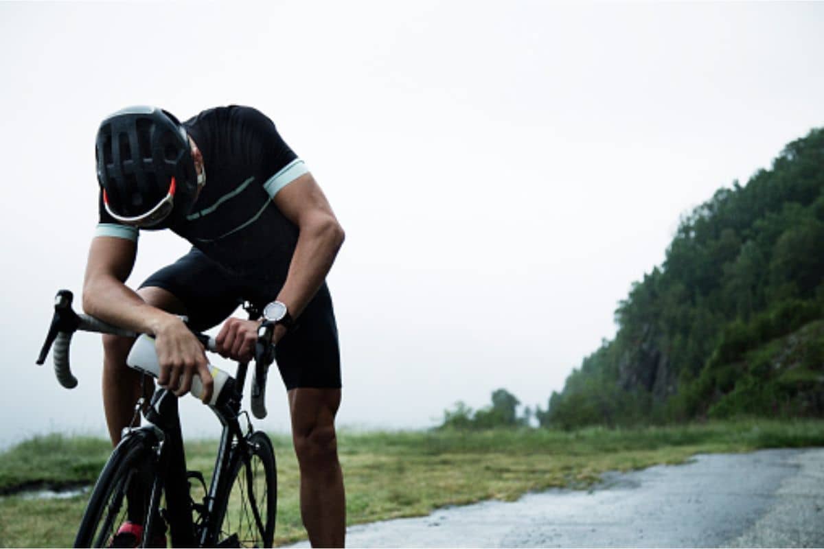 man riding his bike